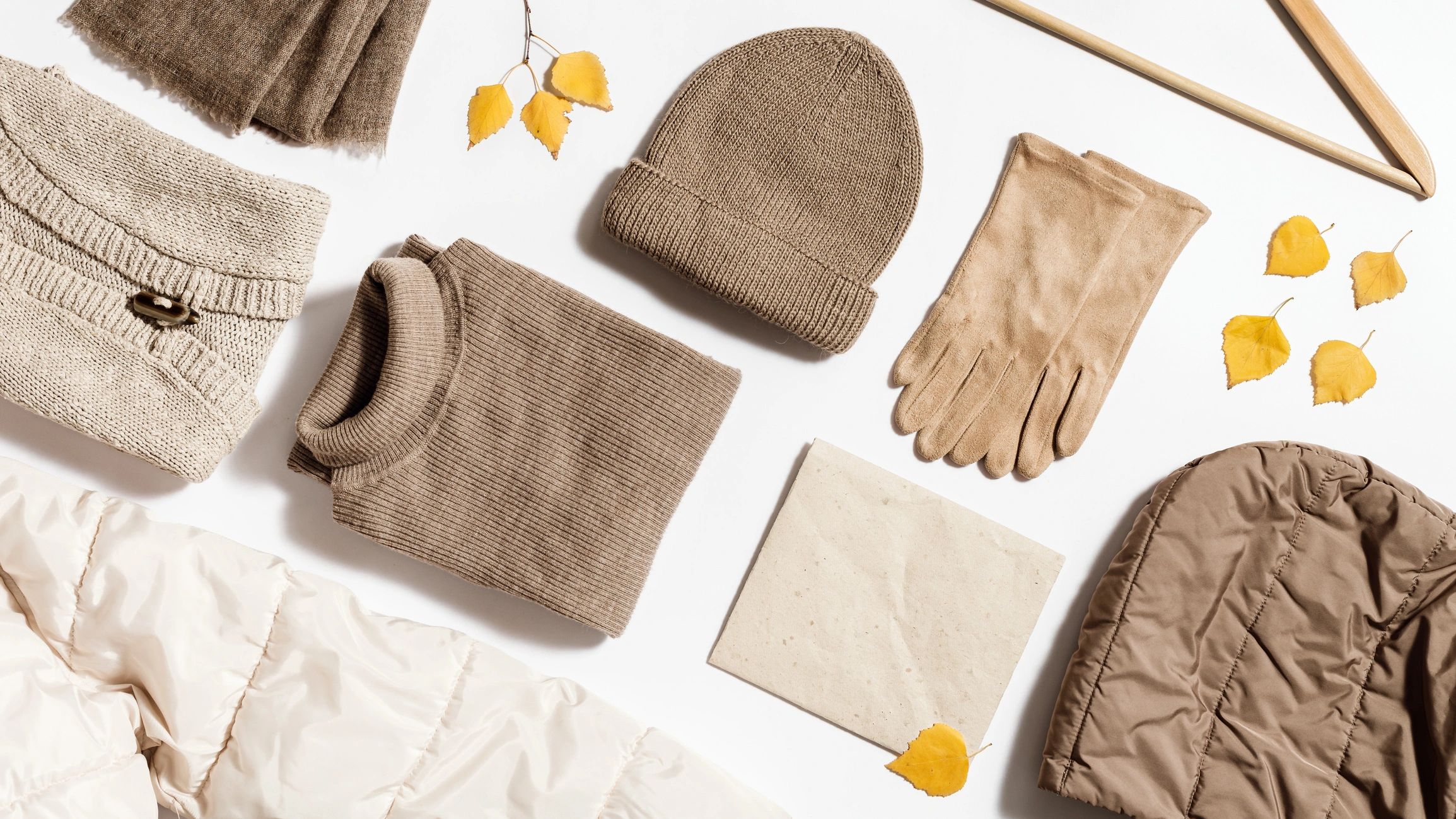 Warm neutral seasonal clothing flat lay