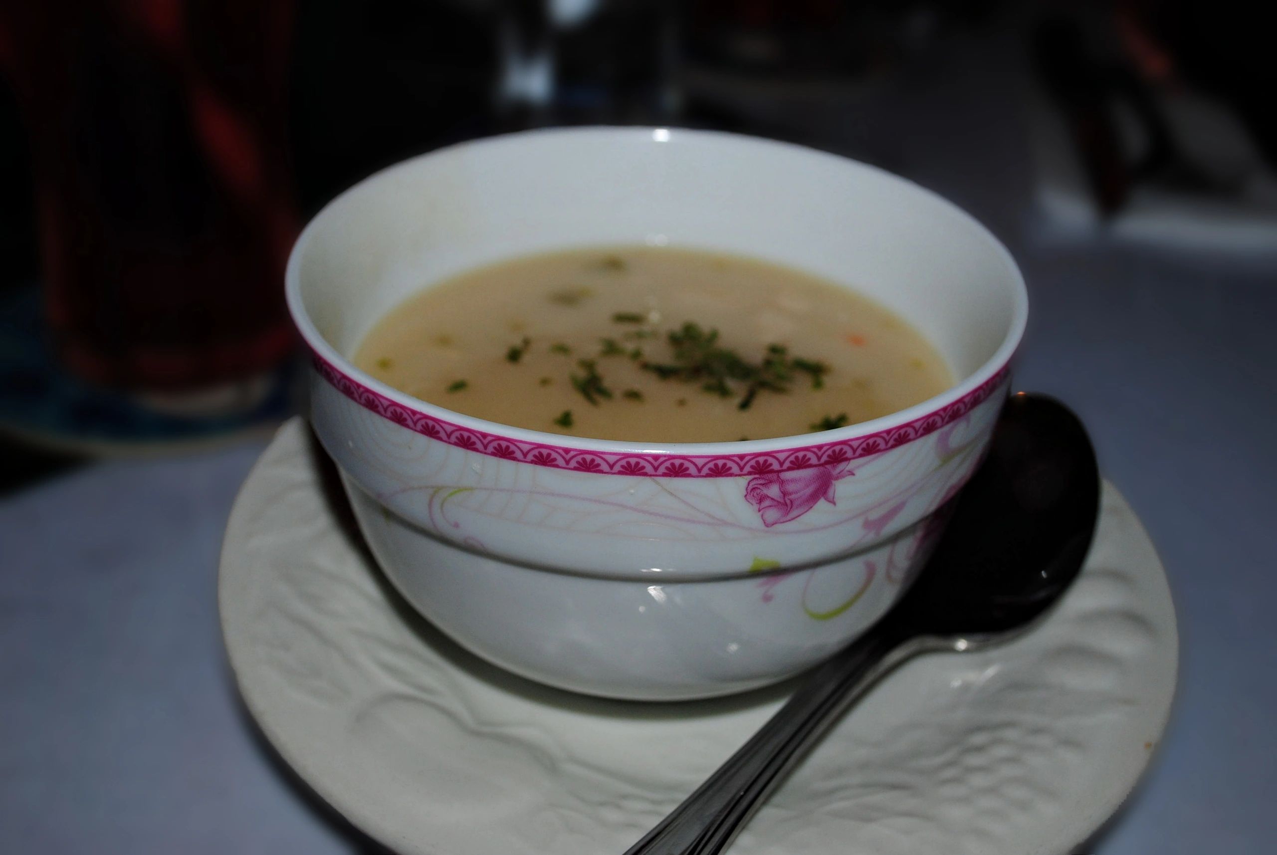 A bowl of soup styled for a simple comforting lunch