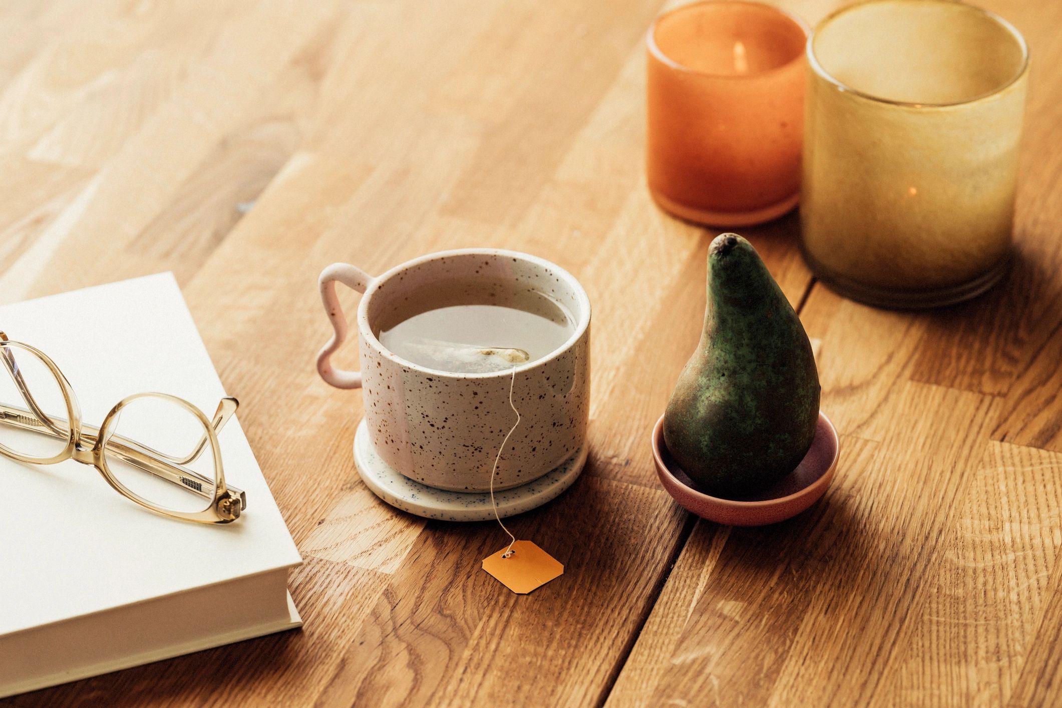 Tea and candles on a cozy table