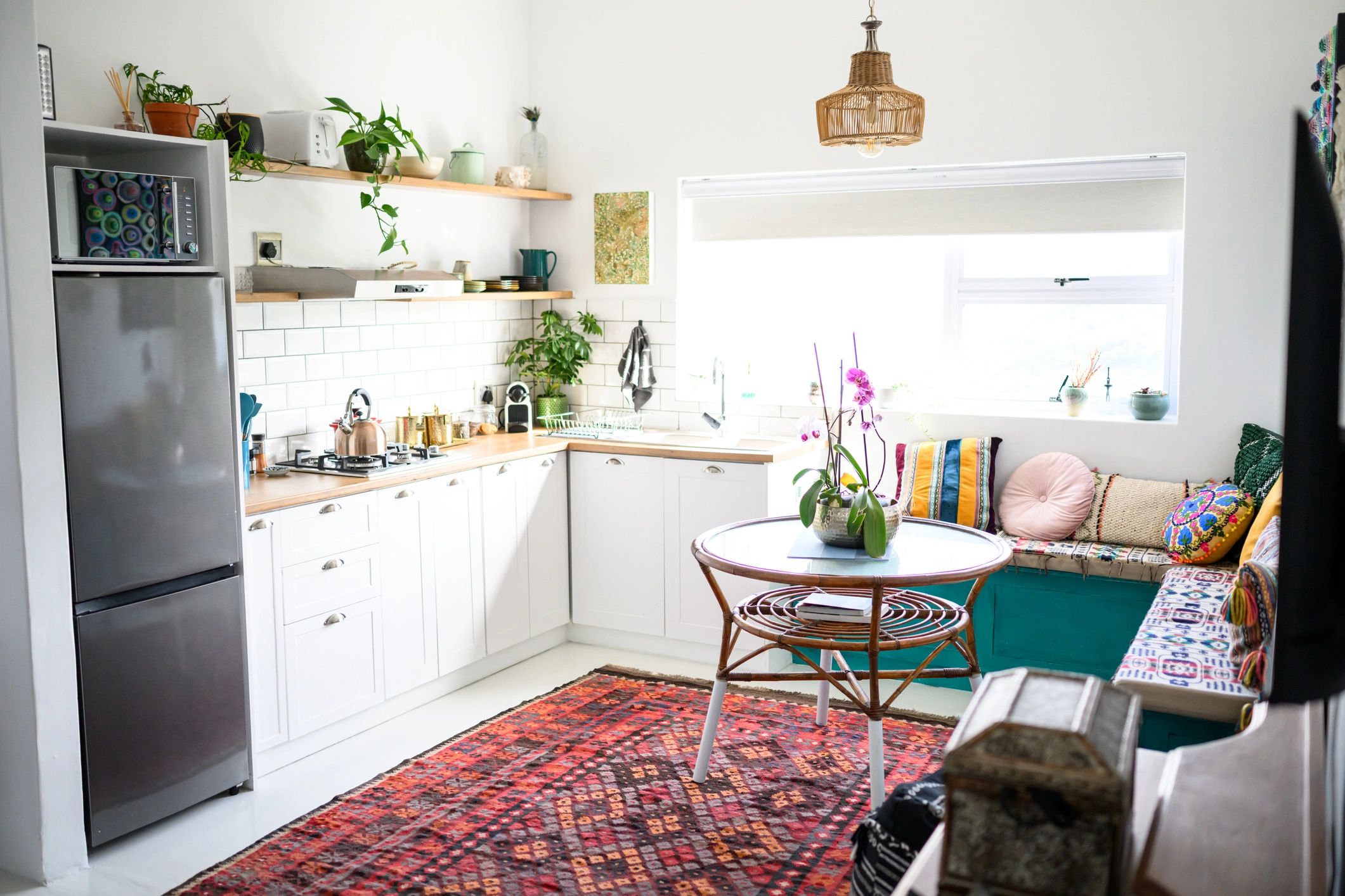 Bright cozy kitchen with plants and warm decor