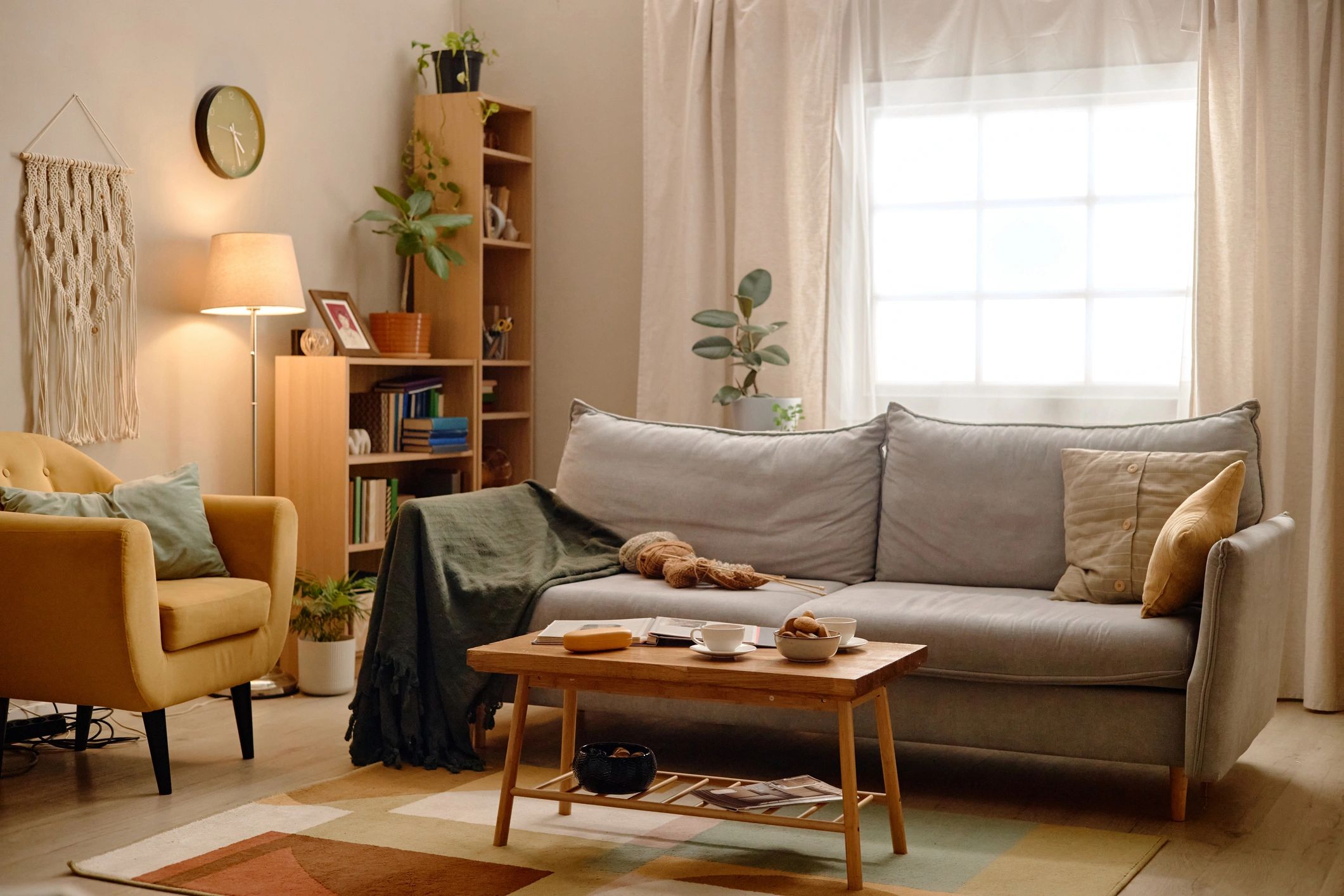 Cozy living room with warm natural light and inviting decor